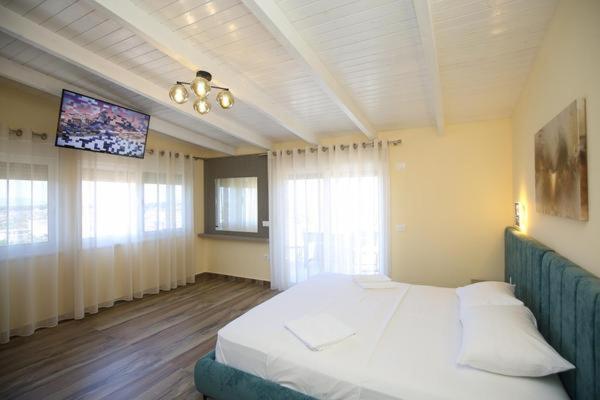 Queen Apartmets Vlorë Rum bild